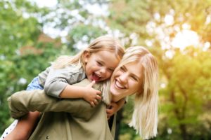 Smiling woman and a girl 