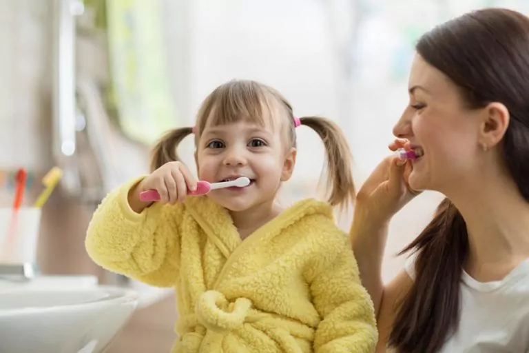 Toddler brushing teeth