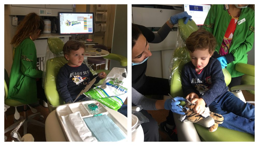 Child Being Comforted by Dental Assistants