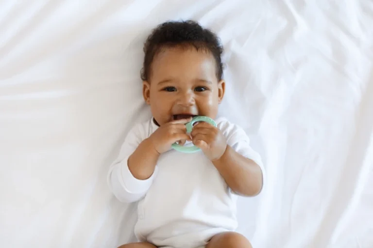 Baby biting a teething toy