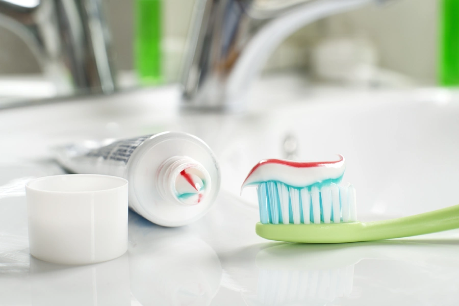 Fluoride toothpaste on a toothbrush