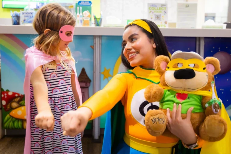 Melo-D playing superhero with a child