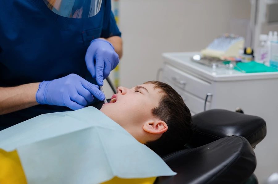 Young boy experiences a dental emergency