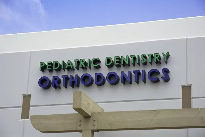 Signage on Building Exterior at Oceanside Location - The Super Dentists