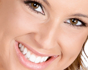Adult Dental Patient Smiling - Flashing Pearly White Veneers - The Super Dentists